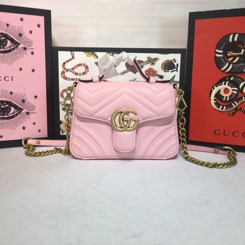 G*u*i top handle bags